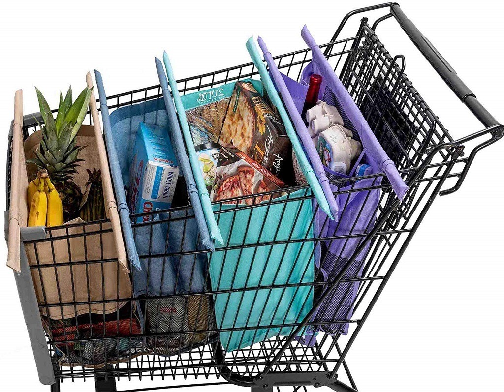 Four colorful shopping bags in a grocery car